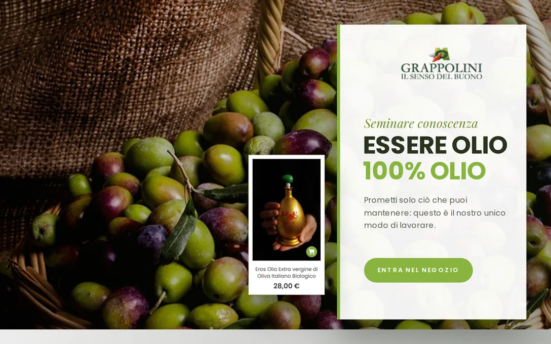 Grappolini: il cesto di olive e il pannello «Essere olio, 100% olio», con una bottiglia del negozio.